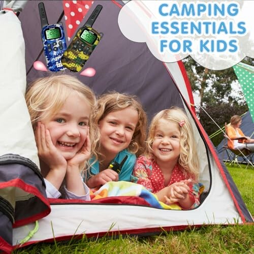 Three children smiling inside a tent with walkie-talkies labeled 'Camping Essentials for Kids'.